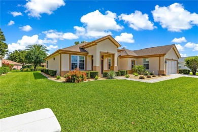 Beautifully updated and modified Granville model boasts on Eagle Ridge At Spruce Creek Country Club in Florida - for sale on GolfHomes.com, golf home, golf lot