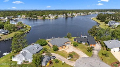 Experience unparalleled waterfront living in this waterfront on Harbour Point Golf Club in North Carolina - for sale on GolfHomes.com, golf home, golf lot