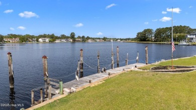 Experience unparalleled waterfront living in this waterfront on Harbour Point Golf Club in North Carolina - for sale on GolfHomes.com, golf home, golf lot