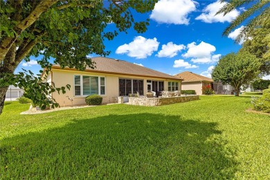 Beautifully updated and modified Granville model boasts on Eagle Ridge At Spruce Creek Country Club in Florida - for sale on GolfHomes.com, golf home, golf lot