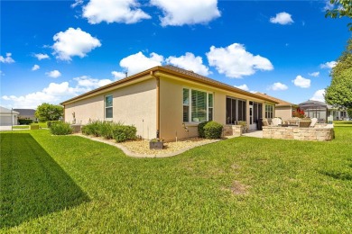 Beautifully updated and modified Granville model boasts on Eagle Ridge At Spruce Creek Country Club in Florida - for sale on GolfHomes.com, golf home, golf lot