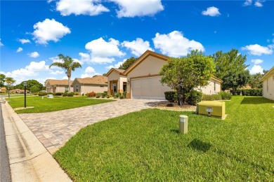 Beautifully updated and modified Granville model boasts on Eagle Ridge At Spruce Creek Country Club in Florida - for sale on GolfHomes.com, golf home, golf lot