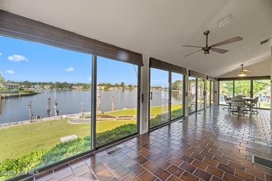 Experience unparalleled waterfront living in this waterfront on Harbour Point Golf Club in North Carolina - for sale on GolfHomes.com, golf home, golf lot