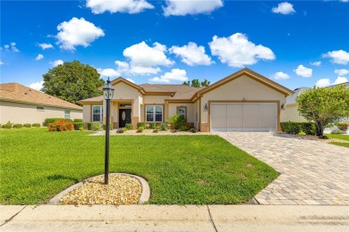 Beautifully updated and modified Granville model boasts on Eagle Ridge At Spruce Creek Country Club in Florida - for sale on GolfHomes.com, golf home, golf lot