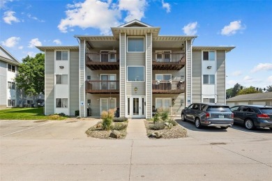 Enjoy top-floor privacy and peaceful views from this pristine on Quail Creek Golf Course in Iowa - for sale on GolfHomes.com, golf home, golf lot