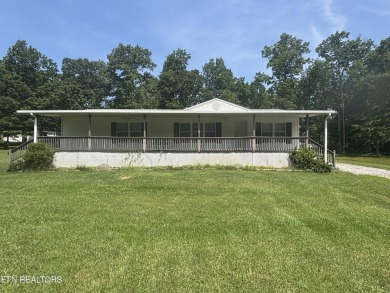Just over an acre in Lake Tansi!! This large split floor plan on Lake Tansi Village Country Club in Tennessee - for sale on GolfHomes.com, golf home, golf lot