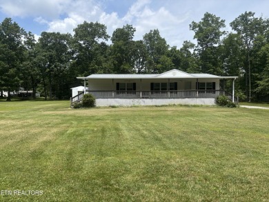 Just over an acre in Lake Tansi!! This large split floor plan on Lake Tansi Village Country Club in Tennessee - for sale on GolfHomes.com, golf home, golf lot