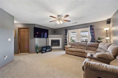 Enjoy top-floor privacy and peaceful views from this pristine on Quail Creek Golf Course in Iowa - for sale on GolfHomes.com, golf home, golf lot