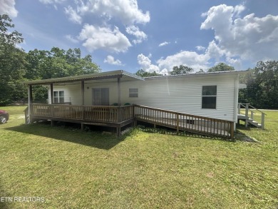 Just over an acre in Lake Tansi!! This large split floor plan on Lake Tansi Village Country Club in Tennessee - for sale on GolfHomes.com, golf home, golf lot