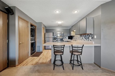 Enjoy top-floor privacy and peaceful views from this pristine on Quail Creek Golf Course in Iowa - for sale on GolfHomes.com, golf home, golf lot