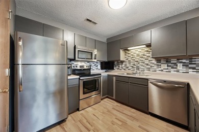 Enjoy top-floor privacy and peaceful views from this pristine on Quail Creek Golf Course in Iowa - for sale on GolfHomes.com, golf home, golf lot