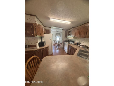 Just over an acre in Lake Tansi!! This large split floor plan on Lake Tansi Village Country Club in Tennessee - for sale on GolfHomes.com, golf home, golf lot