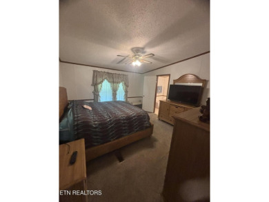 Just over an acre in Lake Tansi!! This large split floor plan on Lake Tansi Village Country Club in Tennessee - for sale on GolfHomes.com, golf home, golf lot