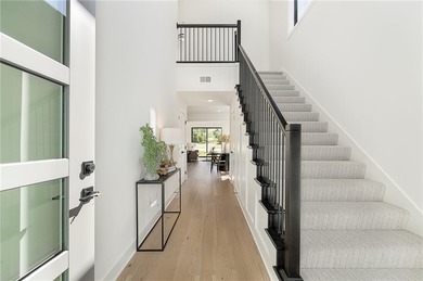 Discover modern, low-maintenance luxury living in this stunning on The Golf Club of Kansas in Kansas - for sale on GolfHomes.com, golf home, golf lot