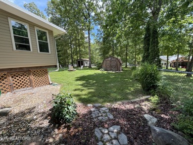 Adorable 3 Bedroom 2 Bath home on double lots with fenced back on Lake Tansi Village Country Club in Tennessee - for sale on GolfHomes.com, golf home, golf lot