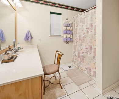 Tucked away on a beautifully wooded lot in the heart of East on Holly Lake Ranch Golf Club in Texas - for sale on GolfHomes.com, golf home, golf lot