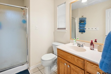 Tucked away on a beautifully wooded lot in the heart of East on Holly Lake Ranch Golf Club in Texas - for sale on GolfHomes.com, golf home, golf lot