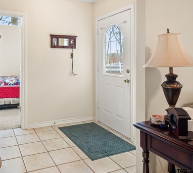 Tucked away on a beautifully wooded lot in the heart of East on Holly Lake Ranch Golf Club in Texas - for sale on GolfHomes.com, golf home, golf lot