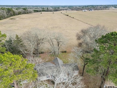Tucked away on a beautifully wooded lot in the heart of East on Holly Lake Ranch Golf Club in Texas - for sale on GolfHomes.com, golf home, golf lot