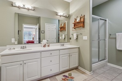 EXPANSIVE CONDO LIVING OVERLOOKING BROWN DEER GOLF COURSE AND on Brown Deer Golf Club in Iowa - for sale on GolfHomes.com, golf home, golf lot