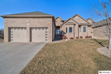 Welcome all to this luxurious brick townhome, situated on a on Wilderness Ridge Golf Club in Nebraska - for sale on GolfHomes.com, golf home, golf lot