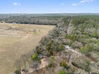 Tucked away on a beautifully wooded lot in the heart of East on Holly Lake Ranch Golf Club in Texas - for sale on GolfHomes.com, golf home, golf lot