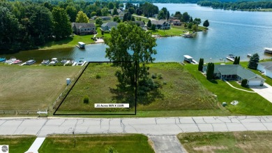 Build your dream home or cottage on this waterfront lot at Lake on The Pines Golf Course at Lake Isabella in Michigan - for sale on GolfHomes.com, golf home, golf lot