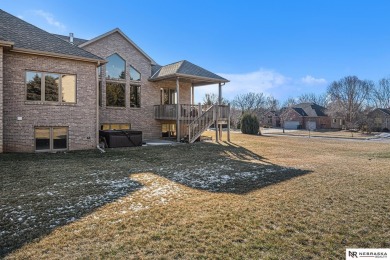 Welcome all to this luxurious brick townhome, situated on a on Wilderness Ridge Golf Club in Nebraska - for sale on GolfHomes.com, golf home, golf lot