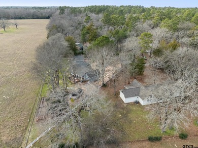 Tucked away on a beautifully wooded lot in the heart of East on Holly Lake Ranch Golf Club in Texas - for sale on GolfHomes.com, golf home, golf lot