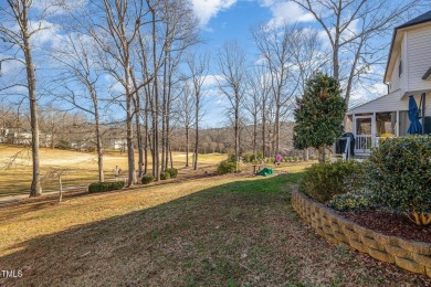 Tucked away on a peaceful cul-de-sac, this charming home backs on Riverwood Golf and Athletic Club in North Carolina - for sale on GolfHomes.com, golf home, golf lot