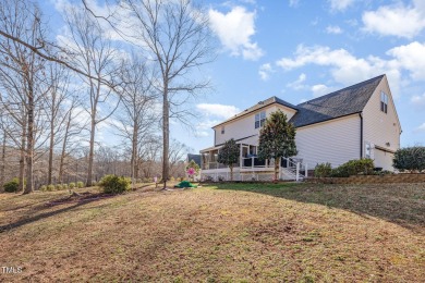 Tucked away on a peaceful cul-de-sac, this charming home backs on Riverwood Golf and Athletic Club in North Carolina - for sale on GolfHomes.com, golf home, golf lot