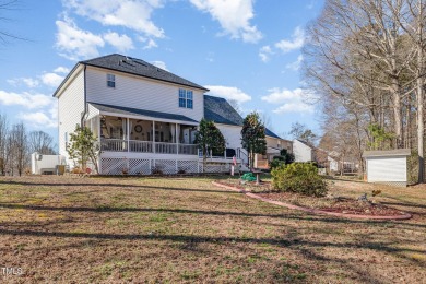 Tucked away on a peaceful cul-de-sac, this charming home backs on Riverwood Golf and Athletic Club in North Carolina - for sale on GolfHomes.com, golf home, golf lot