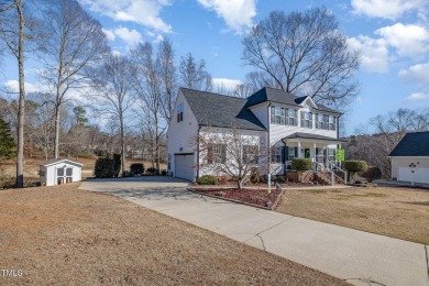 Tucked away on a peaceful cul-de-sac, this charming home backs on Riverwood Golf and Athletic Club in North Carolina - for sale on GolfHomes.com, golf home, golf lot