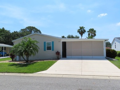 Watch the sunrise or just relax in your glass enclosed 4 season on Crane Lakes Golf and Country Club in Florida - for sale on GolfHomes.com, golf home, golf lot
