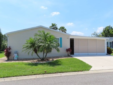 Watch the sunrise or just relax in your glass enclosed 4 season on Crane Lakes Golf and Country Club in Florida - for sale on GolfHomes.com, golf home, golf lot