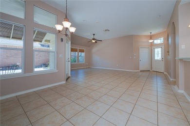 Welcome to this charming patio-style home! As you come inside on Rockport Country Club in Texas - for sale on GolfHomes.com, golf home, golf lot