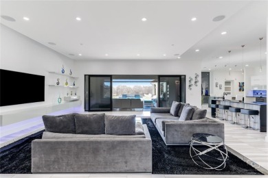 This ultra-modern smart home, on a rare double golf course lot on The Trails of Frisco Golf Club in Texas - for sale on GolfHomes.com, golf home, golf lot