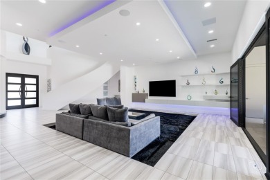 This ultra-modern smart home, on a rare double golf course lot on The Trails of Frisco Golf Club in Texas - for sale on GolfHomes.com, golf home, golf lot