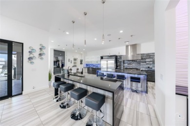 This ultra-modern smart home, on a rare double golf course lot on The Trails of Frisco Golf Club in Texas - for sale on GolfHomes.com, golf home, golf lot