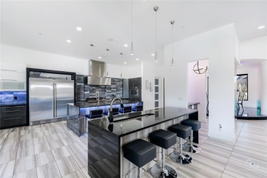 This ultra-modern smart home, on a rare double golf course lot on The Trails of Frisco Golf Club in Texas - for sale on GolfHomes.com, golf home, golf lot