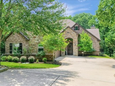 Tucked into a premium wooded homesite backing to greenbelt in on Rock Creek Golf Club in Texas - for sale on GolfHomes.com, golf home, golf lot