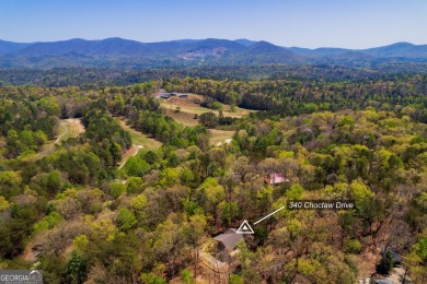 Welcome to your perfect mountain retreat in the heart of on White Path Golf Club in Georgia - for sale on GolfHomes.com, golf home, golf lot