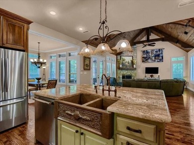 Tucked into a premium wooded homesite backing to greenbelt in on Rock Creek Golf Club in Texas - for sale on GolfHomes.com, golf home, golf lot