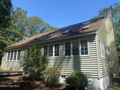 Experience the essence of coastal living in this well maintained on The Country Club of the Crystal Coast in North Carolina - for sale on GolfHomes.com, golf home, golf lot
