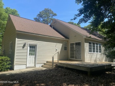 Experience the essence of coastal living in this well maintained on The Country Club of the Crystal Coast in North Carolina - for sale on GolfHomes.com, golf home, golf lot
