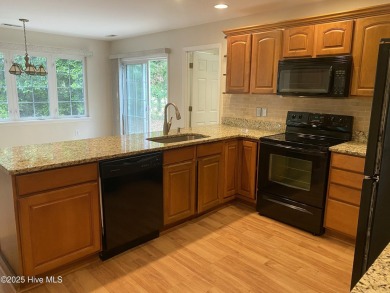 Experience the essence of coastal living in this well maintained on The Country Club of the Crystal Coast in North Carolina - for sale on GolfHomes.com, golf home, golf lot