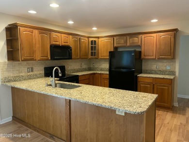 Experience the essence of coastal living in this well maintained on The Country Club of the Crystal Coast in North Carolina - for sale on GolfHomes.com, golf home, golf lot