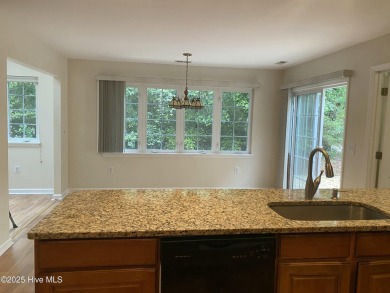 Experience the essence of coastal living in this well maintained on The Country Club of the Crystal Coast in North Carolina - for sale on GolfHomes.com, golf home, golf lot