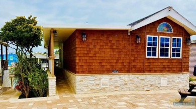 Waterfront charm meets custom design at 841 W Oyster in Long on Long Island Golf Course in Texas - for sale on GolfHomes.com, golf home, golf lot