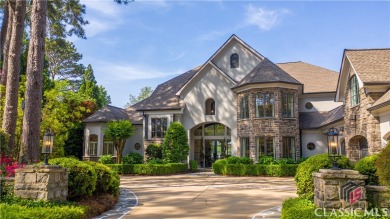 Introducing the ultimate lakefront estate in Cuscowilla on Lake on The Golf Club at Cuscowilla in Georgia - for sale on GolfHomes.com, golf home, golf lot